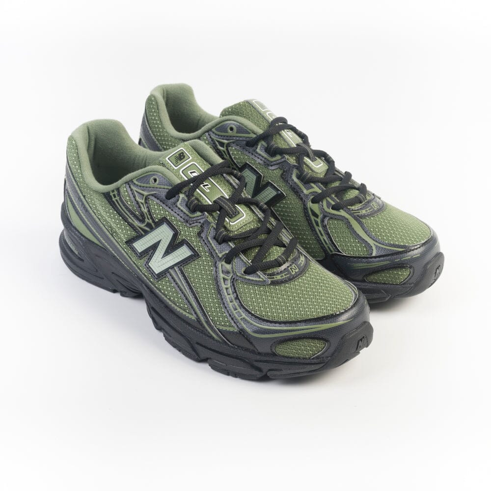 NEW BALANCE - Sneakers U7403DN - Verde nera Scarpe Uomo NEW BALANCE - Collezione Uomo