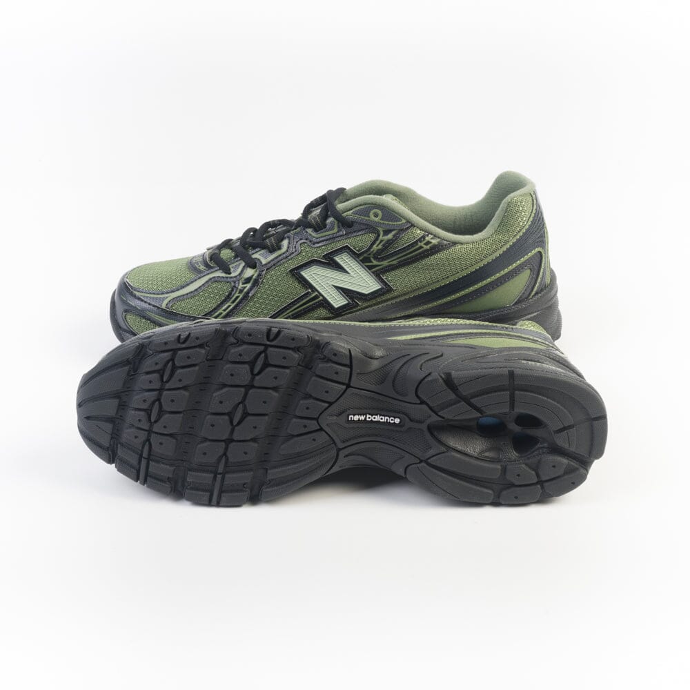 NEW BALANCE - Sneakers U7403DN - Verde nera Scarpe Uomo NEW BALANCE - Collezione Uomo