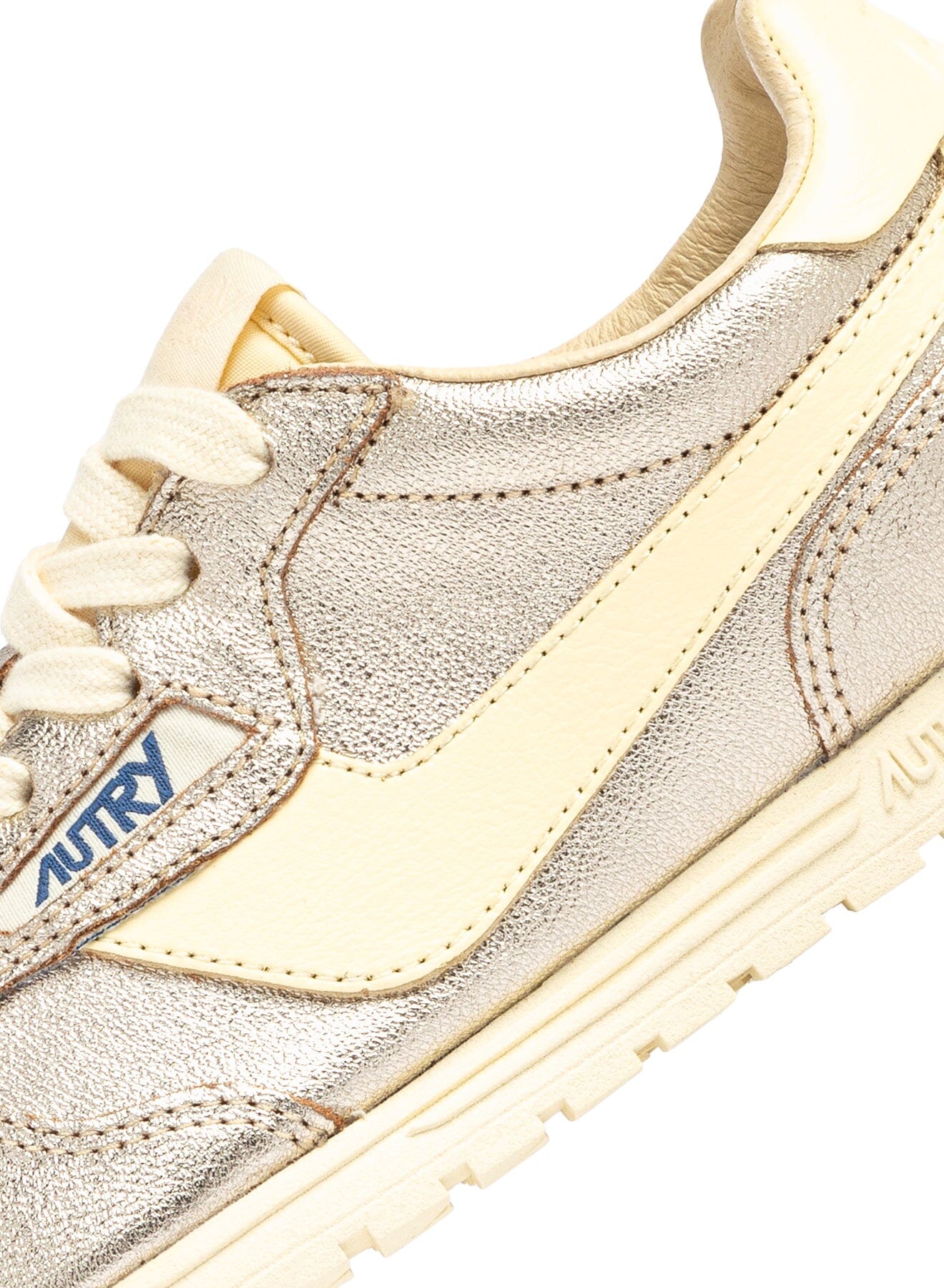 AUTRY - WSLWA J01 - Sneakers WINDSPIN - Laminato Oro Scarpe Donna AUTRY - Collezione donna