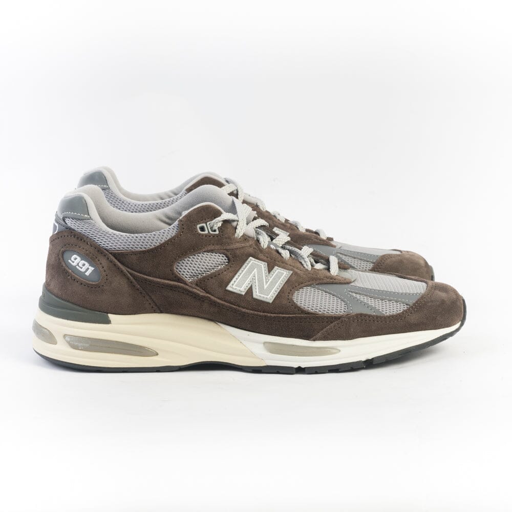 NEW BALANCE - Sneakers - U991BG2 - Marrone Grigio Scarpe Uomo NEW BALANCE - Collezione Uomo 