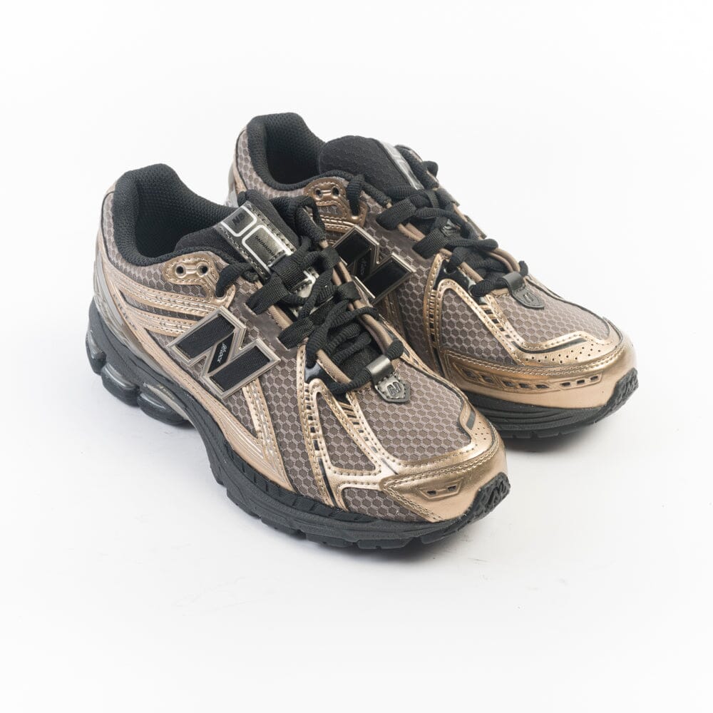 NEW BALANCE - Sneakers U1906RCJ - Nero Oro Scarpe Donna NEW BALANCE - Collezione Donna 